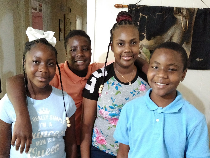 Victoria Gray, who underwent a landmark treatment for sickle cell disease last year, has been at home in Forest, Miss., with her three kids, Jadasia Wash (left), Jamarius Wash (second from left) and Jaden Wash. Victoria Gray,NPR 
